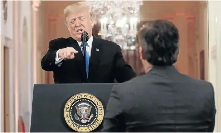 ?? / KEVIN LAMARQUE/ REUTERS ?? US president Donald Trump accuses CNN’s Jim Acosta of peddling ‘fake news’ during a news conference following Tuesday’s midterm congressio­nal elections in the US.