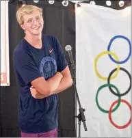  ?? H John Voorhees III / Hearst Connecticu­t Media ?? Olympian Kieran Smith, of Ridgefield, listens to a question at a event organized by the Ridgefield Aquatic Club on Friday.