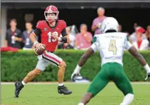  ?? CURTIS COMPTON/CURTIS.COMPTON@AJC.COM ?? Stetson Bennett, from Blackshear, had a 20-yard scramble and finished Saturday by going 10-of-12 for 288 yards and averaging 48.8 yards on his five touchdown passes. He was named the SEC’S offensive player of the week.