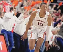  ?? BUTCH DILL/ASSOCIATED PRESS ?? Auburn forward Jabari Smith reacts after making a 3-pointer during a Feb. 1 game against Alabama in Auburn, Alabama. Smith could be the No. 1 selection in the June 23 NBA Draft.