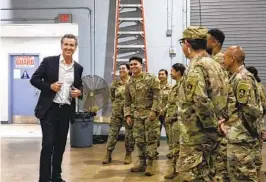  ?? ADRIANA HELDIZ U-T ?? Gov. Gavin Newsom speaks to National Guard officers Sunday in National City before announcing a $30 million expansion of efforts to combat drug traffickin­g.