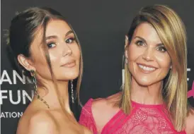  ?? CHRIS PIZZELLO/INVISION/AP ?? Olivia Jade Giannulli with her mother, Lori Loughlin, on Feb. 28 in Beverly Hills, California.