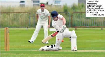  ??  ?? Carmarthen Wanderers batsman Gareth Thomas in action against Gorseinon on Saturday.
Pic: Phil Davies