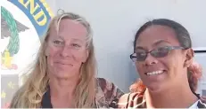  ??  ?? Jennifer Appel, (left), and Tasha Fuiava on the USS Ashland.