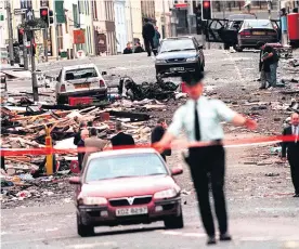  ??  ?? The 1998 Omagh bombing, and (left) Liam Campbell, who is wanted in Lithuania. Right, from top: SDLP councillor­s Mary Garrity, John Coyle and Adam Gannon