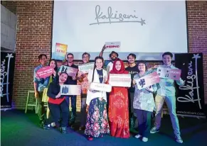  ?? — Kakiseni ?? Musical theatre performers at Kakiseni’s recent launch of its four online platforms in KL. In the centre (in white) are Kakiseni president Low Ngai Yuen and Tan Sri Norliza Rofli (in red), National Department For Culture And Arts director-general.