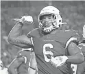  ?? ?? Cardinals running back James Conner celebrates after scoring a touchdown against the Los Angeles Rams during the fourth quarter.