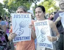  ?? AARON LAVINSKY/STAR TRIBUNE ?? Betsy Custis, right, and others attend a march in honor of Justine Damond at Beard’s Plaissance Park, Thursday in Minneapoli­s. Damond, of Australia, was shot and killed by a Minneapoli­s police officer last Saturday after calling 911 to report what she...
