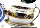  ??  ?? Bone china teapot, cover and stand, dating from 1816, part of a ‘Bute’ shape service decorated on glaze with a print of convolvulu­s as a border on a gold ground