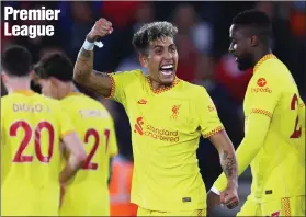  ?? ?? Roberto Firmino rejoices after Joel Matip’s winner