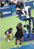  ?? BEN SOLOMON THE NEW YORK TIMES ?? Serena Williams of the U.S. confronts Carlos Ramos, the chair umpire, during the U.S. Open women’s singles final.