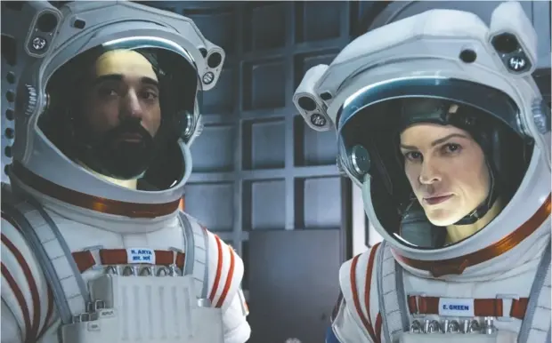  ?? Diyah Pera / Netflix ?? Among the many space series available for streaming is the short-lived Away, starring Ray Panthaki and Hilary Swank.