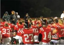  ?? PATRICK CROSSAN — FOR DIGITAL FIRST MEDIA ?? Coatesvill­e’s Matt Ortega talks to his team after Friday night’s big win over West Chester East.