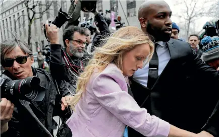  ?? PHOTOS: AP ?? Porn actress Stormy Daniels arrives at federal court in New York for a hearing where a federal judge considered how to review material the FBI seized from US President Donald Trump’s personal lawyer Michael Cohen in a raid on his office last week.