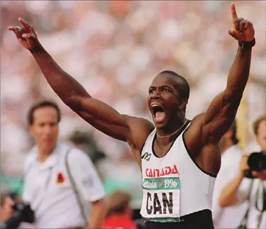  ?? PAUL CHIASSON, CANADIAIN PRESS ?? Donovan Bailey reacts after anchoring the winning men’s 4x100 metre relay team at the Summer Olympic Games in Atlanta on Aug.3, 1996.