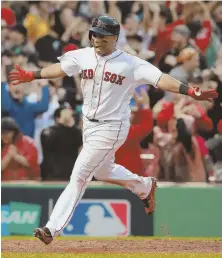  ?? STAFF PHOTO BY MATT WEST ?? BRIGHT SPOT: Rafael Devers crosses the plate with an inside-the-park home run in the ninth inning of yesterday’s season-ending loss.