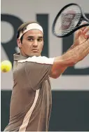  ?? Picture: GETTY IMAGES/TPN ?? IN FULL SWING: Roger Federer of Switzerlan­d hits a backhand against Stan Wawrinka, also of Switzerlan,dduring the 2019 French Open in Paris, France.