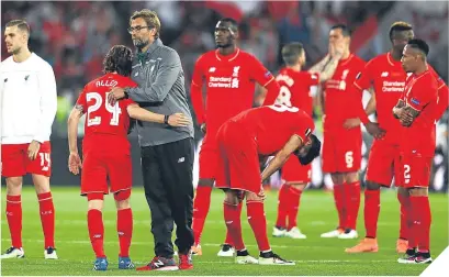  ??  ?? ■
It was dejection for Klopp and his squad 12 months ago in Basel.