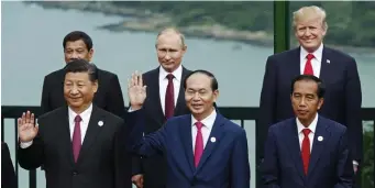  ?? Ap file ?? SPILLING THE BEANS: President Trump, back right, will have piqued the interest of other world leaders in the country’s formerly secret weapons system.