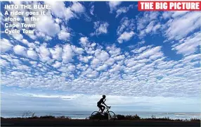  ??  ?? INTO THE BLUE: A rider goes it alone in the Cape Town Cycle Tour