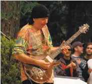  ?? Scott Wall 1999 ?? Carlos Santana performs at Stern Grove in 1999, one of many greats to grace the festival’s lineup.