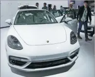  ?? TROY HARVEY / BLOOMBERG ?? Porsche’s Panamera Turbo S e-hybrid vehicle is displayed ahead of the Los Angeles Auto Show in the United States last year.