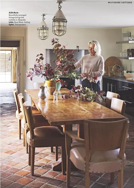  ??  ?? Kitchen
Beautifull­y arranged foliage brings the outside in. Bespoke
table, Bow Wow. Ceiling lights, Trainspott­ers