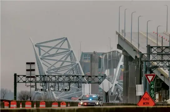  ?? JASON ANDREW/NEW YORK TIMES ?? The Dali container ship struck and collapsed the Francis Scott Key Bridge in Baltimore on Tuesday.