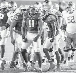  ?? WILLIE J. ALLEN JR./ORLANDO SENTINEL ?? Florida State defensive end Jermaine Johnson celebrates after a tackle Sunday at Doak Campbell Stadium in Tallahasse­e.