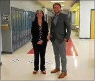  ??  ?? Troy Prep High School leaders Katie Yezzi and Mark Muscatiell­o in the new high school hallway.