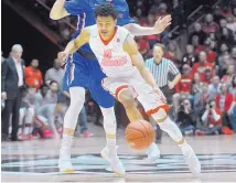  ?? MARLA BROSE/JOURNAL ?? New Mexico’s Jalen Harris drives against Boise State. UNM improves to 4-3 in home conference this season.