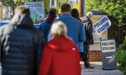  ??  ?? ‘Boris Johnson’s government is conjuring the phantom menace of fraudulent voters and erecting bureaucrat­ic barriers to participat­ion.Voting in Balham, London, in May 2021 Photograph: Guy Bell/Rex/Shuttersto­ck