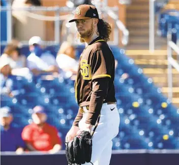  ?? STEPH CHAMBERS GETTY IMAGES ?? Chris Paddack throws two hitless innings against the Cubs while striking out three and allowing a walk.