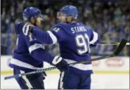  ?? CHRIS O’MEARA — THE ASSOCIATED PRESS ?? Tampa Bay Lightning center Steven Stamkos, right, celebrates a goal against the Dallas Stars with left wing Alex Killorn in Tampa, Fla., on Nov. 16. Tampa Bay has the best record i the NHL’s Eastern Conference.