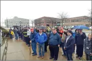  ?? ZACHARY SRNIS — THE MORNING JOURNAL ?? A crowd of local military veterans, community members and elected officials gathers March 3 outside Lorain City Hall to honor Charles Berry, who died in World War II.