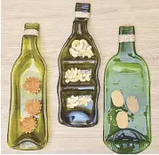  ??  ?? Classy and elegant yet eco-friendly pressed bottles turned into serving platters by Ysa’s Crafts