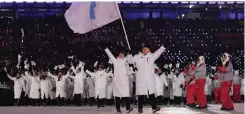  ??  ?? JUNTOS. Los atletas de Corea del Norte y Corea del Sur desfilaron en febrero.