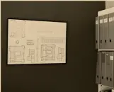  ??  ?? Far right Framed architectu­ral plans for Wellington parliament buildings hang in Mahoney’s office.