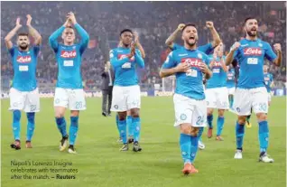  ?? — Reuters ?? Napoli’s Lorenzo Insigne celebrates with teammates after the match.