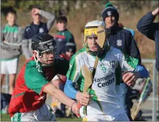  ??  ?? Seamie O’Hagan of Buffers Alley is tackled by Kyle Kenny.