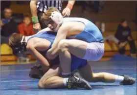 ?? AUSTIN HERTZOG - MNG FILE ?? Daniel Boone’s JT Hogan won the 138-pound title at the District 3-AAA Section 1 tournament last weekend at Gov. Mifflin.