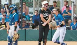  ?? RICARDO RAMIREZ BUXEDA/ORLANDO SENTINEL PHOTOS ?? Deltona shortstop Sophie Strempel (16) celebrates after scoring against Clay High of Green Cove Springs in an FHSAA Class 4A state semifinal victory on Thursday. Strempel knocked in two runs and then scored herself in a big sixth inning for the Wolves.