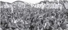  ?? AGENCE FRANCE PRESSE ?? Supporters attend an election campaign rally for Indonesia’s Defence Minister and presidenti­al candidate Prabowo Subianto at the Gelora Sidoarjo Stadium in Sidoarjo, East Java, ahead of Indonesia’s presidenti­al and legislativ­e polls scheduled to be held on February 14.