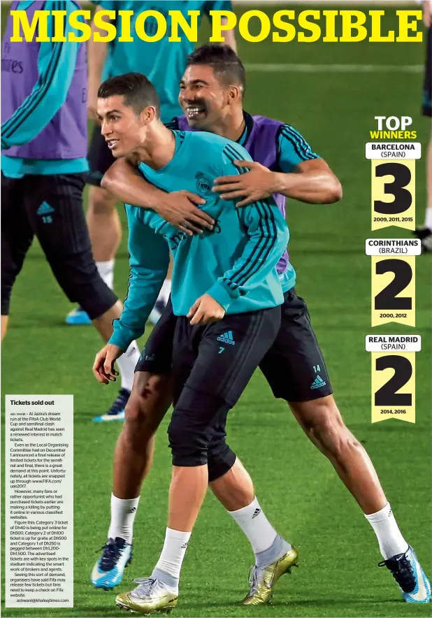  ?? Photo by Ryan Lim ?? Real Madrid midfielder Casemiro (right) holds his teammate Cristiano Ronaldo during a training session in Abu Dhabi on Monday. UAE’s Al Jazira take on Real Madrid on Wednesday. —