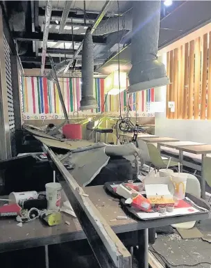  ?? Picture by Jessica Palmer ?? ●● Storm damage inside the McDonald’s on Hulley Road