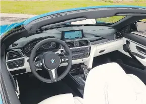  ??  ?? The droptop on this 2018 BMW 440i xDrive Cabriolet is a metal roof that provides the car with a good seal for driving in all four seasons.