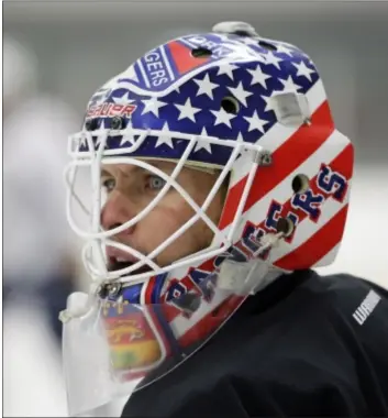  ?? AP Photo ?? Rangers goalie Martin Biron looks on during an informal practice in Amherst, N.Y.