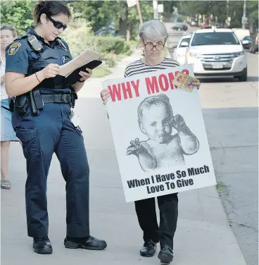  ?? PETER J. THOMPSON / NATIONAL POST FILES ?? Abortion protester Linda Gibbons is arrested in front of the Morgentale­r Clinic in Toronto after a silent protest in September 2015. Gibbons has served more than 10 years in jail for protesting abortion, Christie Blatchford writes.