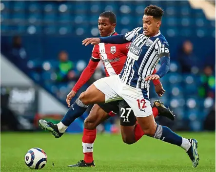  ?? — AFP ?? That’s mine: West Brom’s Matheus Pereira (right) vying for the ball with Southampto­n’s Ibrahima Diallo during the English Premier League match at the Hawthorns.