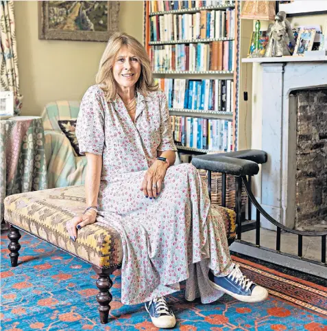  ?? ?? Cottage industry: Dundas runs her dress business from her East Sussex home